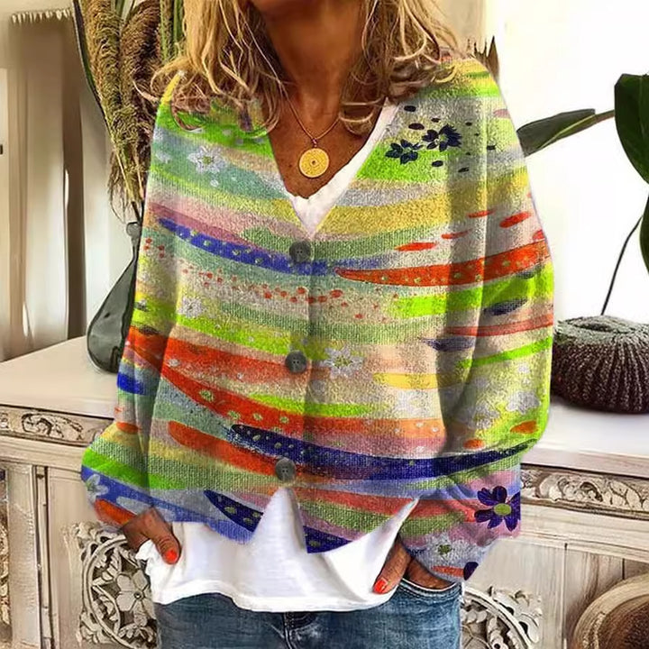 Damens avslappnade stickade cardigan med färgglada ränder och knappdetaljer Mirla-Eva Jonsson