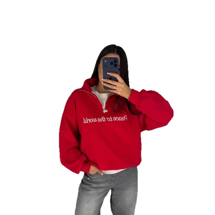 Damens avslappnade sweatshirt med hög krage och inspirerande text Mirla-Eva Jonsson
