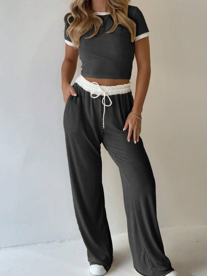 Damens avslappnade tvådelade fritidsset med cropped T-shirt och vida byxor Mirla-Eva Jonsson