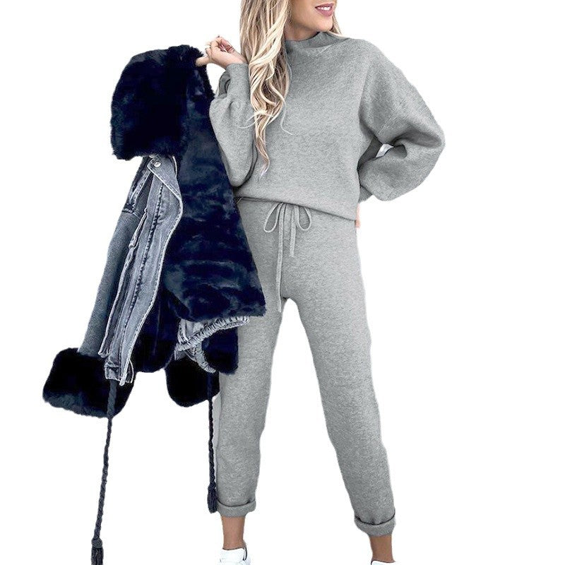 Damens avslappnat stickset med hög midja byxor och ballongärmar Mirla-Eva Jonsson