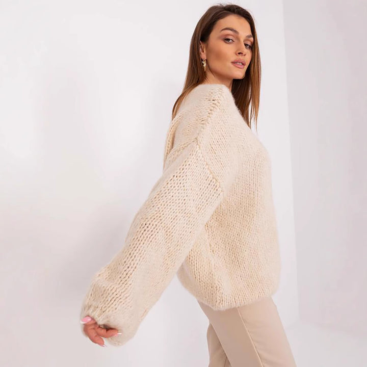 Damens bekväm oversize stickad tröja med voluminösa ärmar och strukturerad design Eva Jonsson-Eva Jonsson
