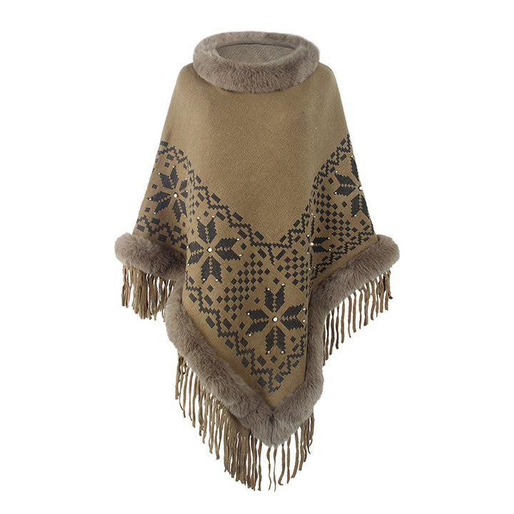 Damens elegant poncho med dekorativt fransdesign och konstpälsdetaljer Mirla-Eva Jonsson
