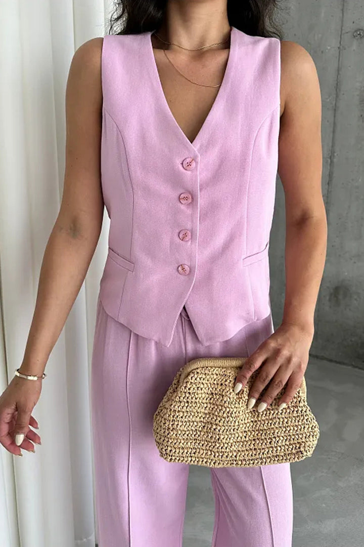 Damens elegant västset med elegant knapprad och fickor Mirla-Eva Jonsson