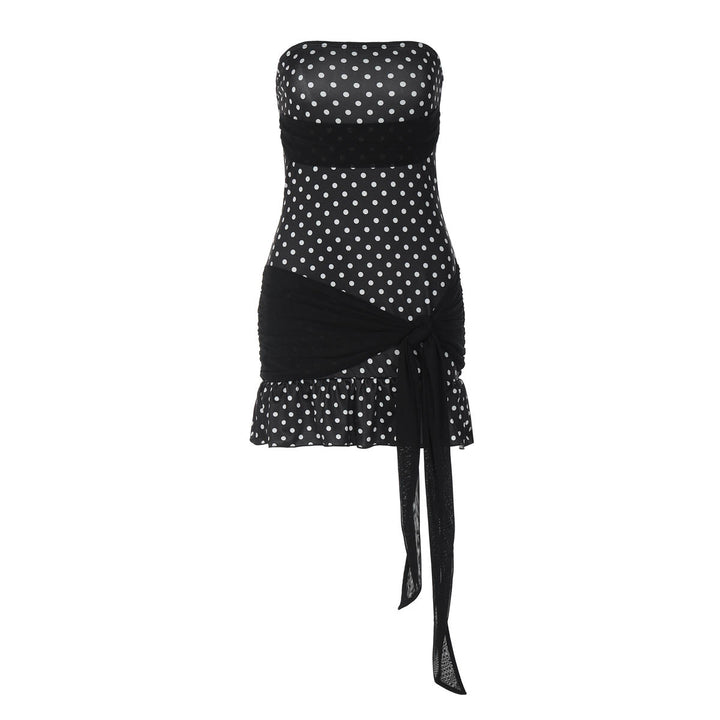 Damens figurnära polka prick klänning med lekfull design i wrap Mirla-Eva Jonsson