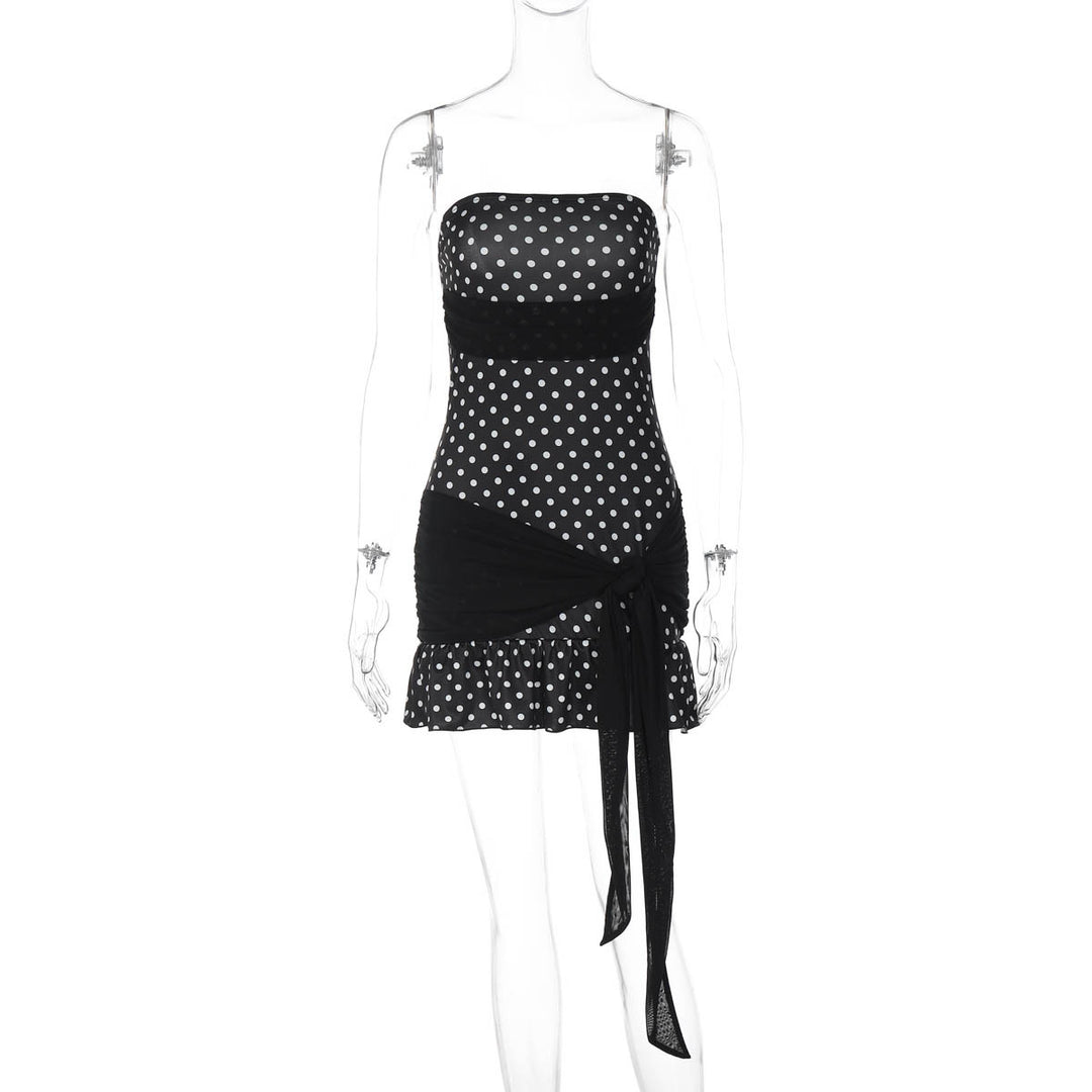 Damens figurnära polka prick klänning med lekfull design i wrap Mirla-Eva Jonsson
