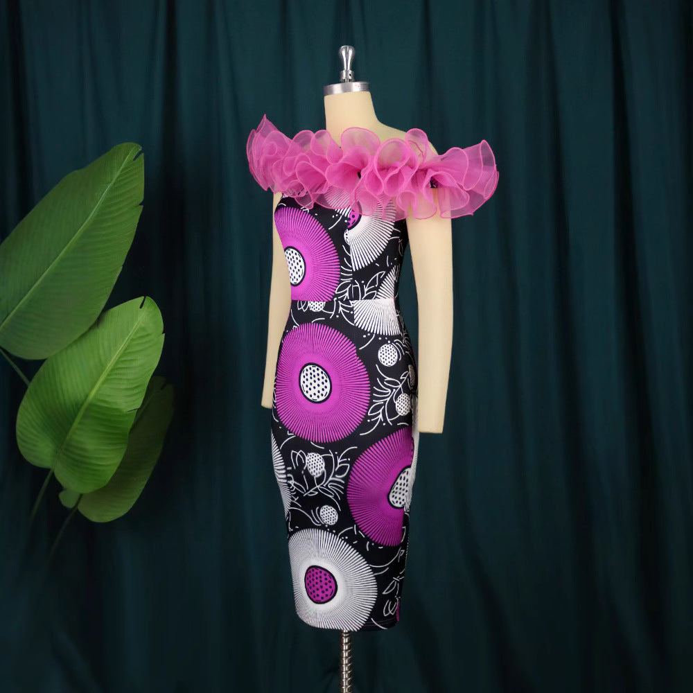Damens figursydda midi-klänning med voluminösa ruffledetaljer Mirla-Eva Jonsson