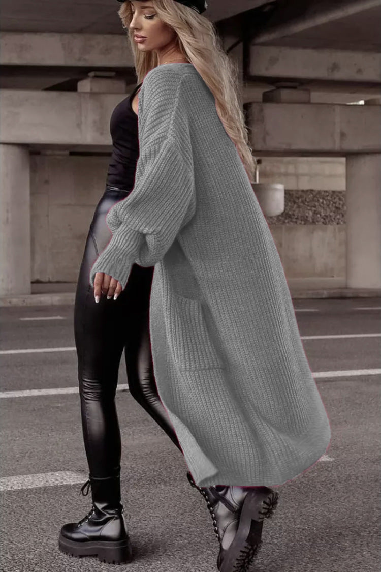 Damens grovstickad kappa i avslappnad oversized stil med djupa fickor Eva Jonsson-Eva Jonsson