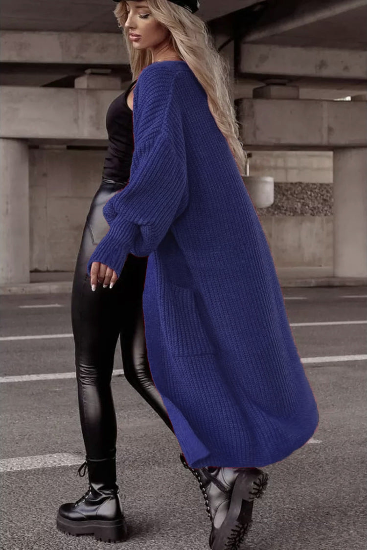 Damens grovstickad kappa i avslappnad oversized stil med djupa fickor Eva Jonsson-Eva Jonsson
