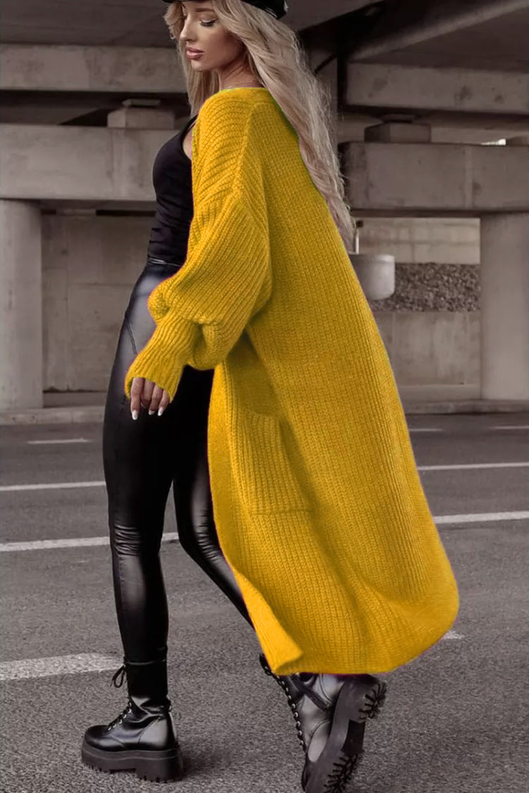 Damens grovstickad kappa i avslappnad oversized stil med djupa fickor Eva Jonsson-Eva Jonsson