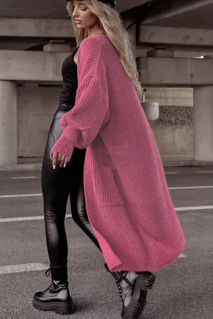 Damens grovstickad kappa i avslappnad oversized stil med djupa fickor Eva Jonsson-Eva Jonsson