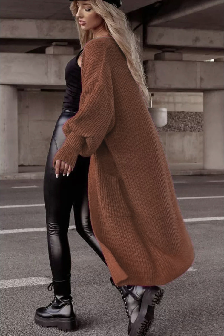 Damens grovstickad kappa i avslappnad oversized stil med djupa fickor Eva Jonsson-Eva Jonsson