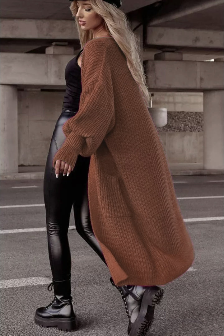 Damens grovstickad kappa i avslappnad oversized stil med djupa fickor Eva Jonsson-Eva Jonsson