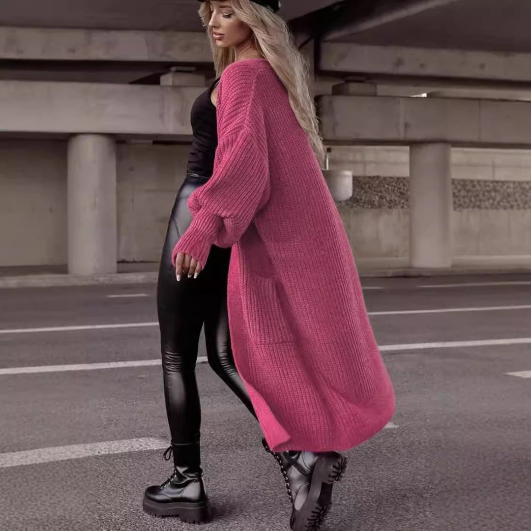 Damens grovstickad kappa i avslappnad oversized stil med djupa fickor Eva Jonsson-Eva Jonsson