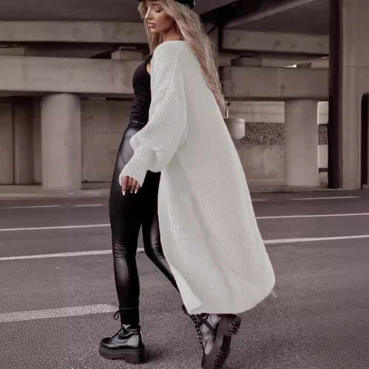 Damens grovstickad kappa i avslappnad oversized stil med djupa fickor Eva Jonsson-Eva Jonsson