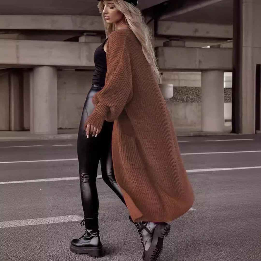 Damens grovstickad kappa i avslappnad oversized stil med djupa fickor Eva Jonsson-Eva Jonsson