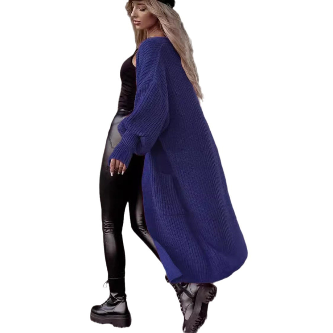 Damens grovstickad kappa i avslappnad oversized stil med djupa fickor Eva Jonsson-Eva Jonsson