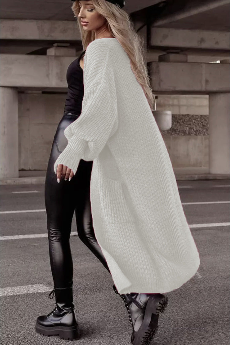Damens grovstickad kappa i avslappnad oversized stil med djupa fickor Eva Jonsson-Eva Jonsson