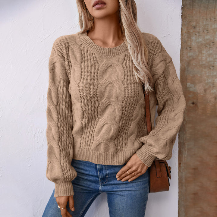 Damens grovt stickad tröja med voluminösa ärmar och flätmönster Mirla-Eva Jonsson