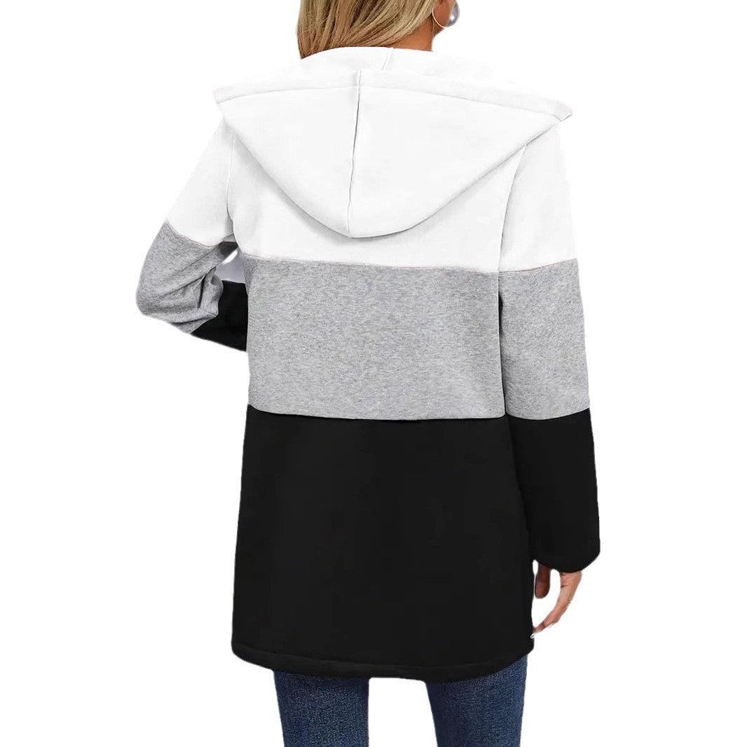 Damens hoodiejacka med modern färgblockdesign och praktiska dragkedjefickor Mirla-Eva Jonsson