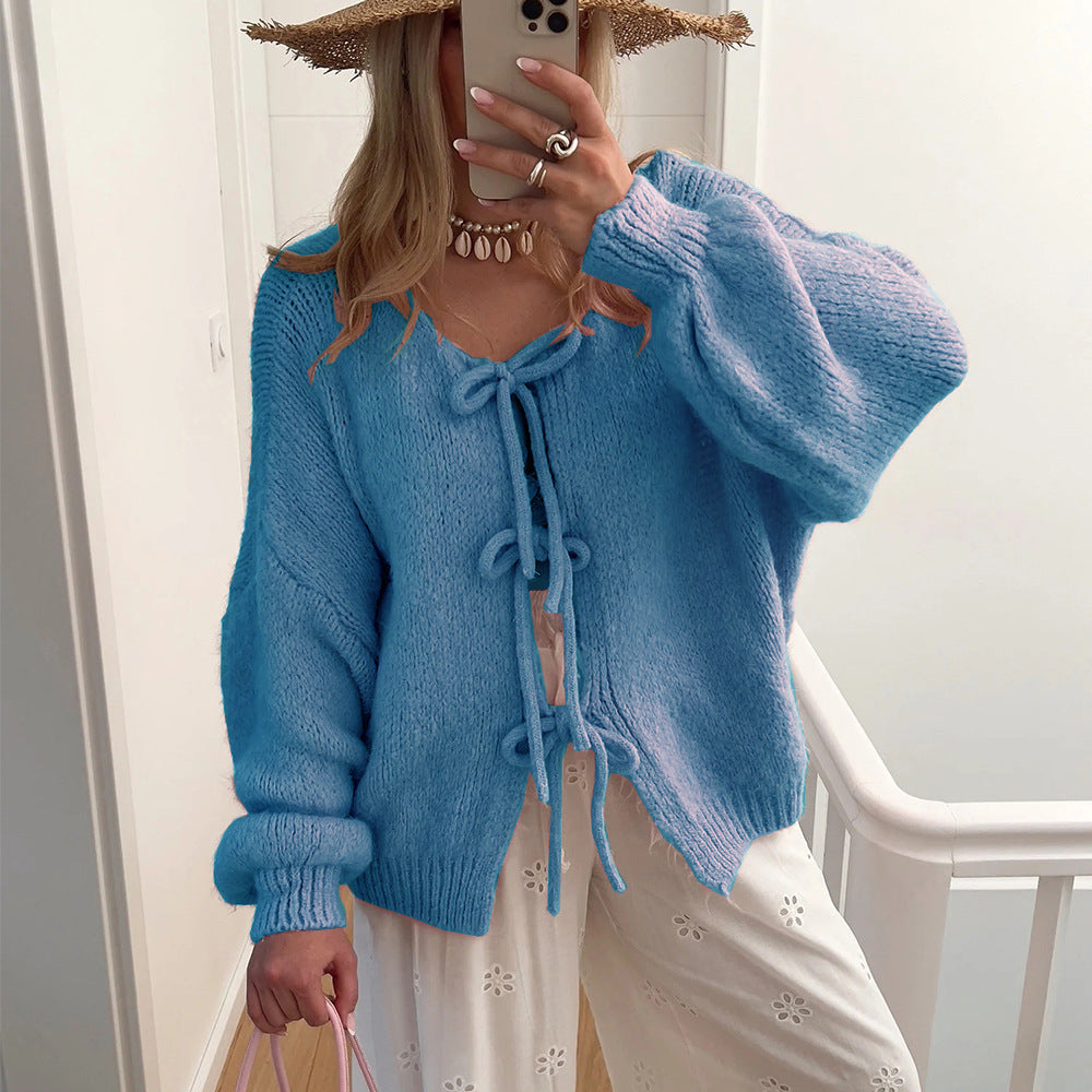 Damens knälång stickad cardigan med dragsko Mirla-Eva Jonsson