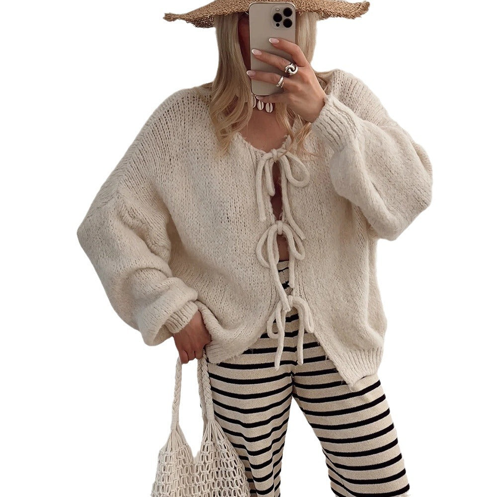 Damens knälång stickad cardigan med dragsko Mirla-Eva Jonsson