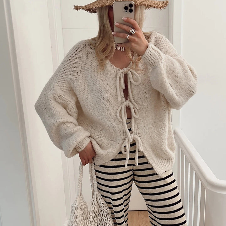 Damens knälång stickad cardigan med dragsko Mirla-Eva Jonsson