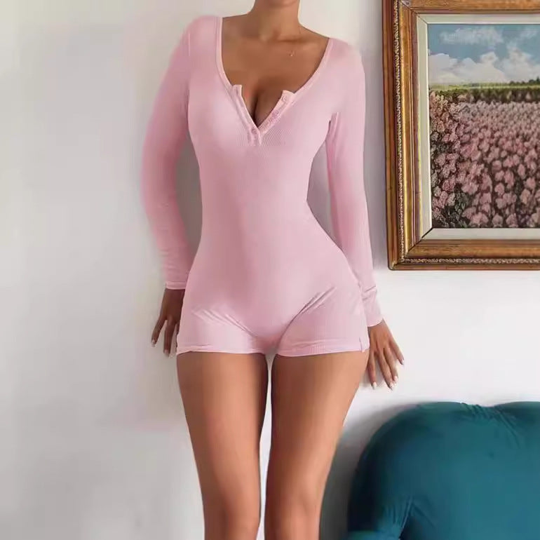 Damens kroppsnära långärmad jumpsuit med fina ribbdetaljer Mirla-Eva Jonsson