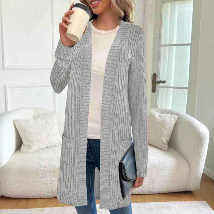 Damens lång kofta med sidfickor och strukturerad design Mirla-Eva Jonsson