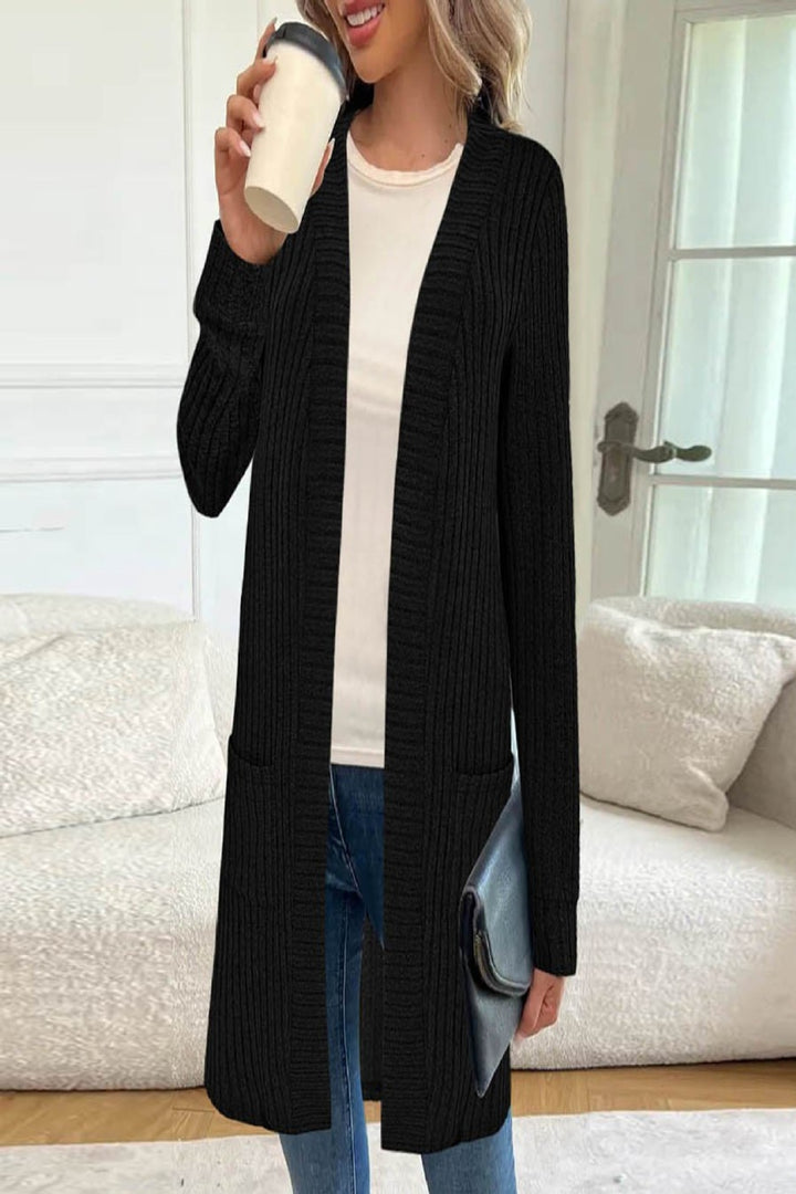 Damens lång kofta med sidfickor och strukturerad design Mirla-Eva Jonsson