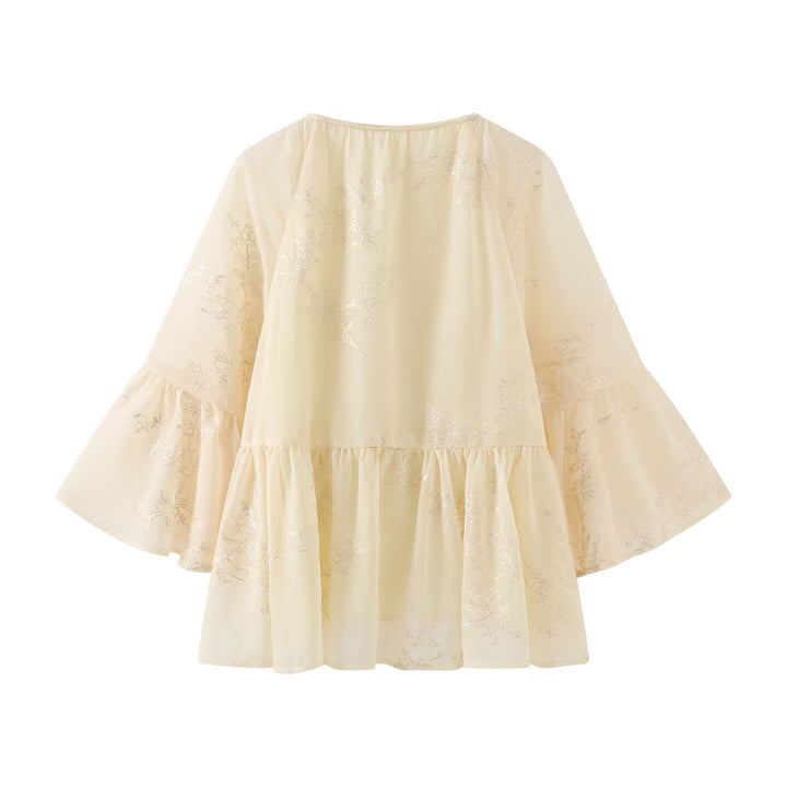 Damens lätt blusshirt med flytande snitt och eleganta snörningsdetaljer Mirla-Eva Jonsson