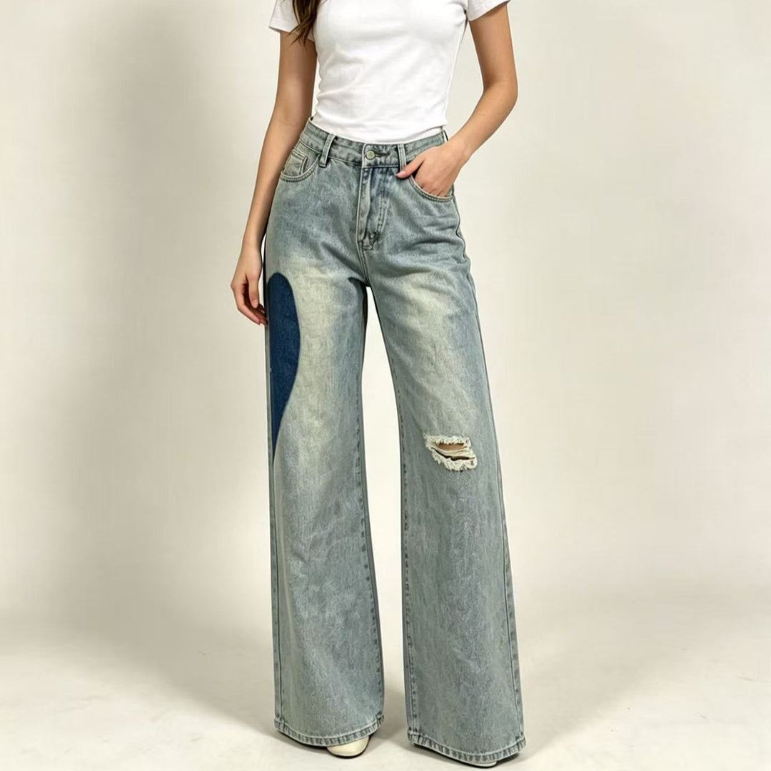 Damens löst snittade denimjeans med unika färgaccenter Mirla-Eva Jonsson