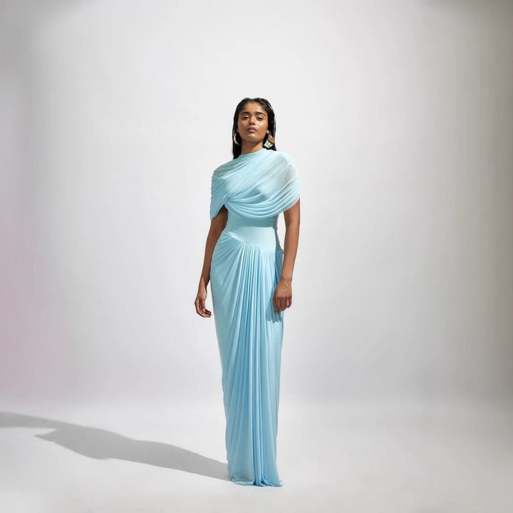 Damens maxikjol med elegant drapering och asymmetriska cut-outs Mirla-Eva Jonsson
