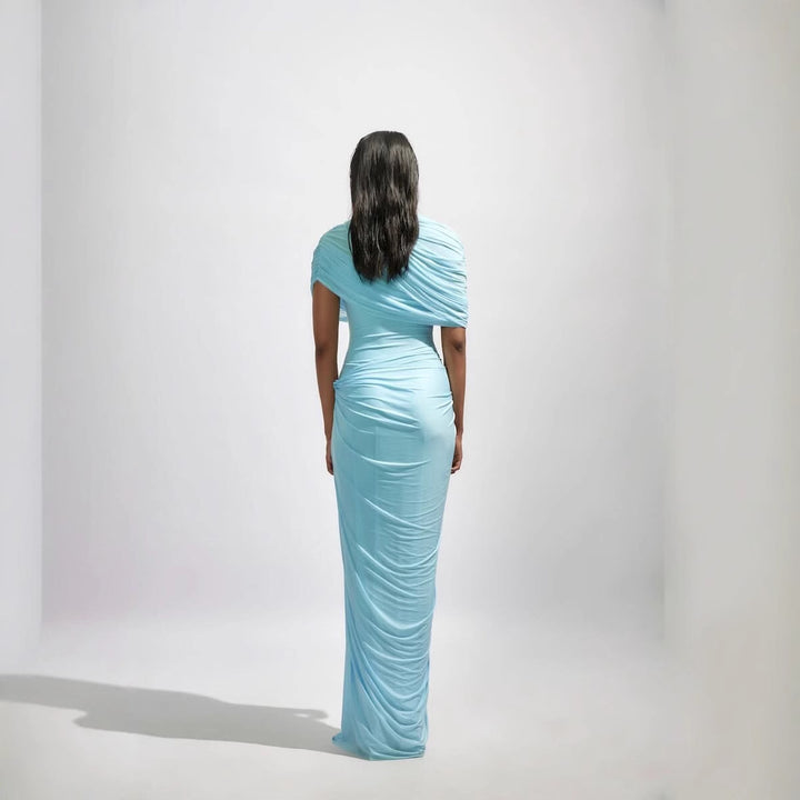 Damens maxikjol med elegant drapering och asymmetriska cut-outs Mirla-Eva Jonsson