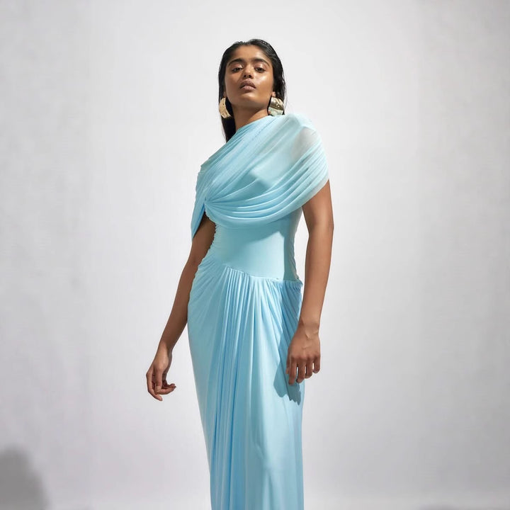 Damens maxikjol med elegant drapering och asymmetriska cut-outs Mirla-Eva Jonsson