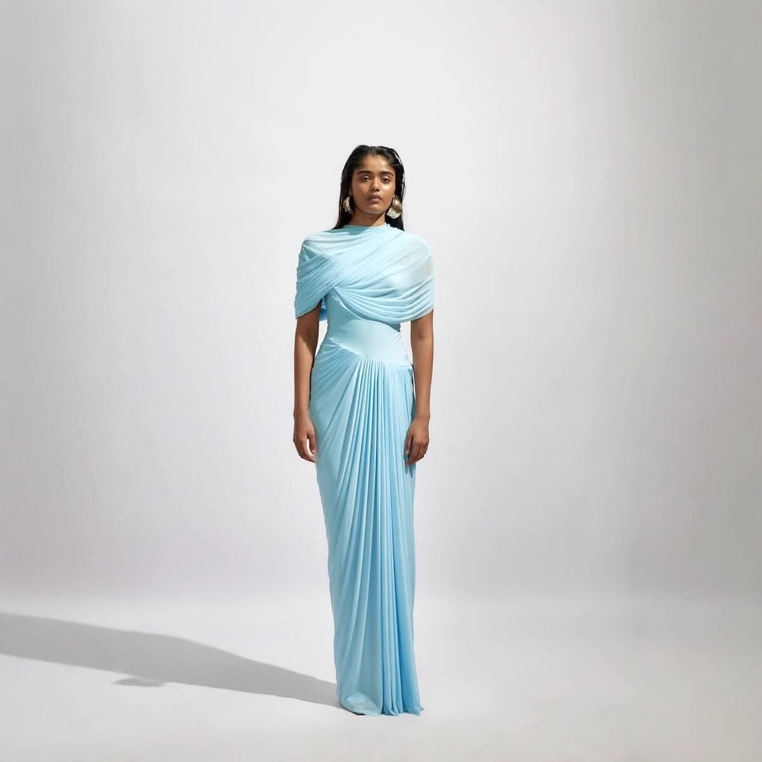 Damens maxikjol med elegant drapering och asymmetriska cut-outs Mirla-Eva Jonsson