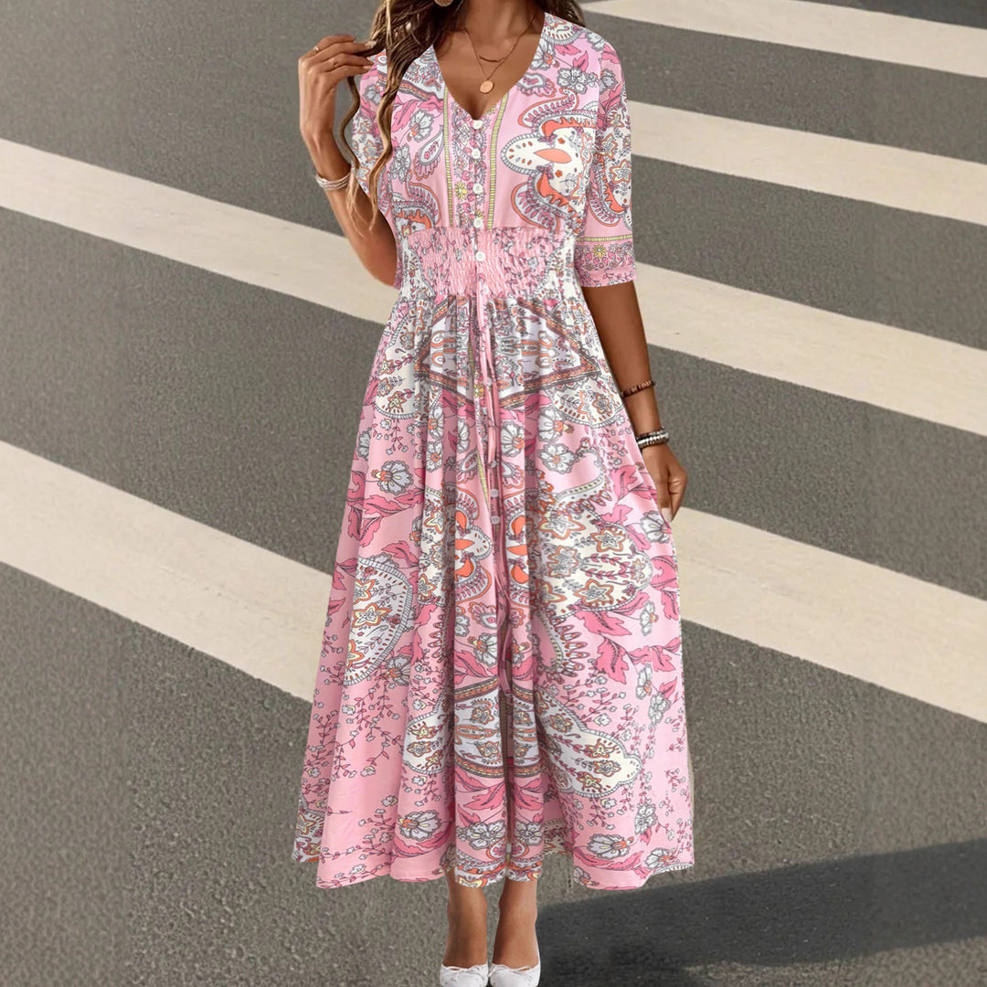 Damens maxiklänning med blommigt paisleymönster och smickrande V-ringning Mirla-Eva Jonsson