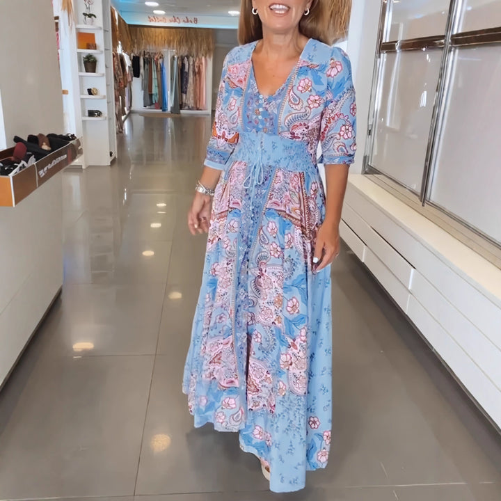Damens maxiklänning med blommigt paisleymönster och smickrande V-ringning Mirla-Eva Jonsson