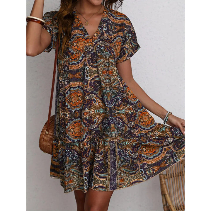 Damens miniklänning med avslappnad V-ringning och voluminös kjol Mirla-Eva Jonsson