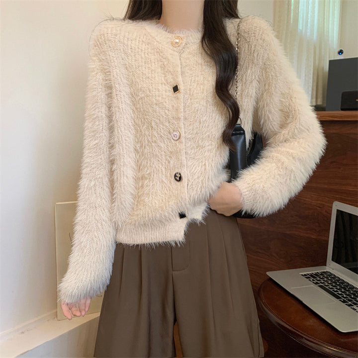 Damens mysiga cardigan med knapplöst design och elegant flair Mirla-Eva Jonsson