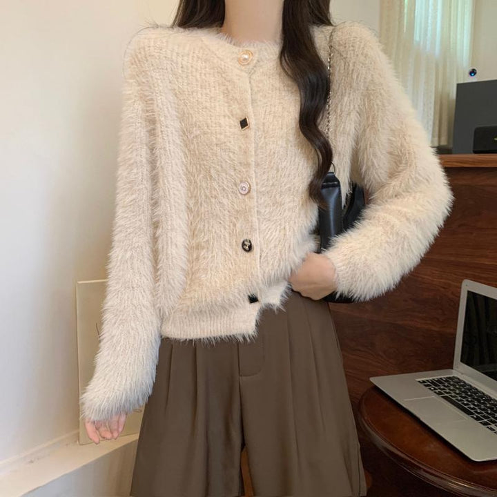 Damens mysiga cardigan med knapplöst design och elegant flair Mirla-Eva Jonsson