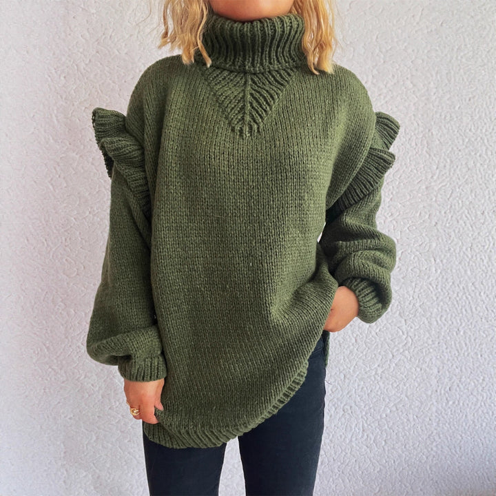 Damens mysiga stricktröja med volangärmar och hög krage Mirla-Eva Jonsson
