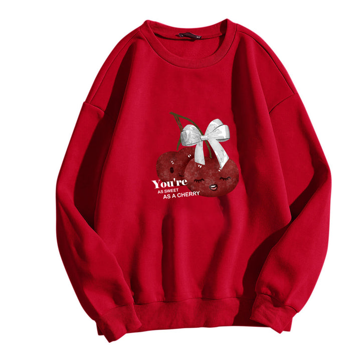 Damens mysiga sweatshirt med fruktig körsbärsmotiv Mirla-Eva Jonsson