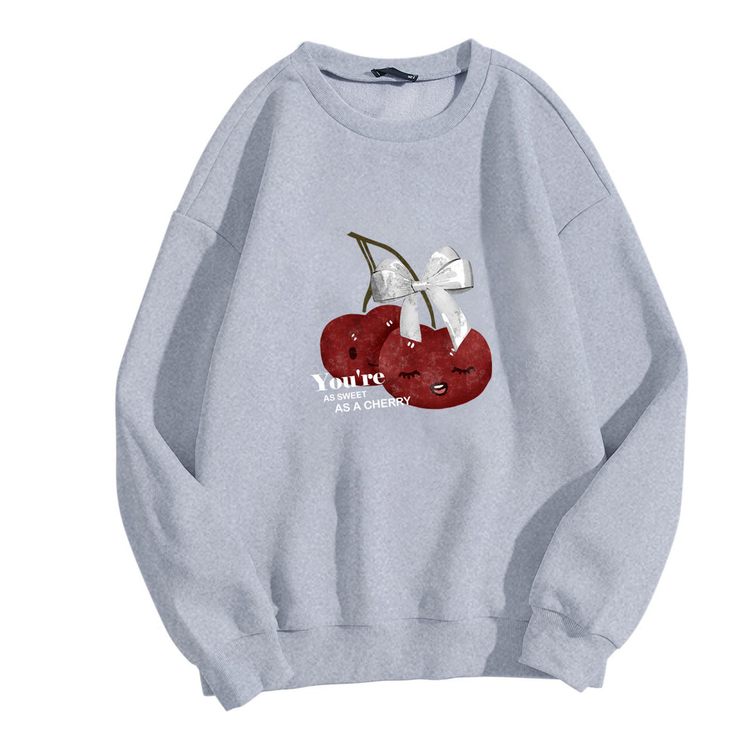 Damens mysiga sweatshirt med fruktig körsbärsmotiv Mirla-Eva Jonsson