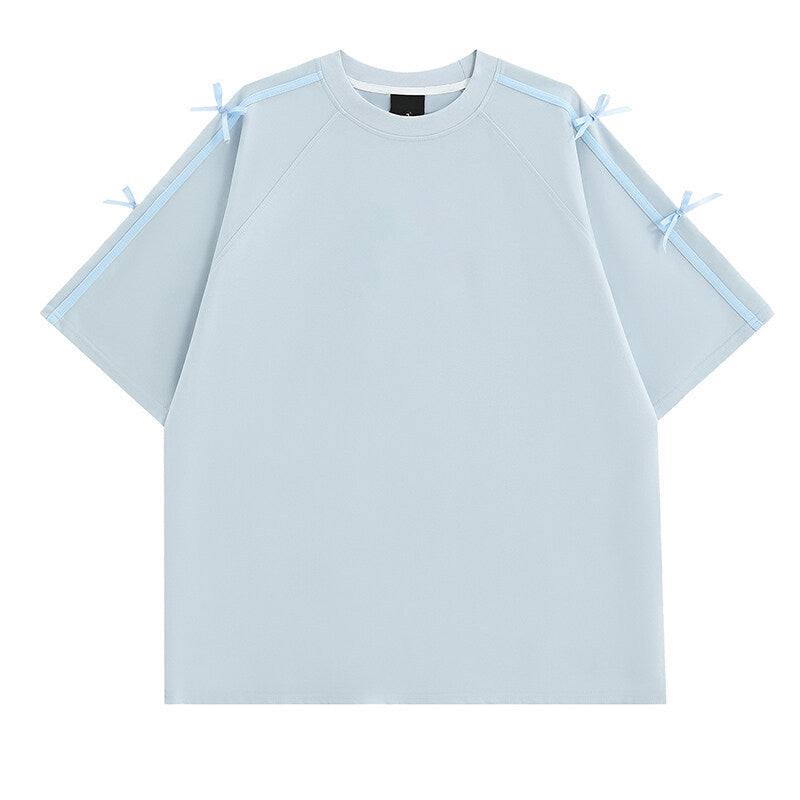 Damens oversized T-shirt med dekorativa knytband Mirla-Eva Jonsson