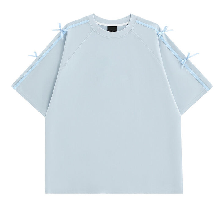 Damens oversized T-shirt med dekorativa knytband Mirla-Eva Jonsson