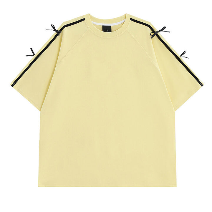 Damens oversized T-shirt med dekorativa knytband Mirla-Eva Jonsson
