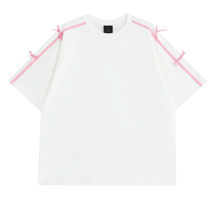 Damens oversized T-shirt med dekorativa knytband Mirla-Eva Jonsson