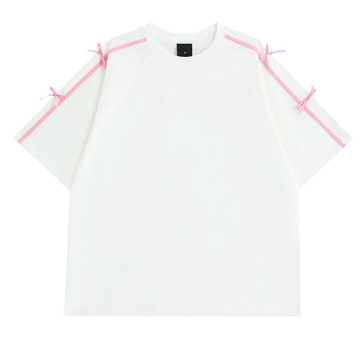 Damens oversized T-shirt med dekorativa knytband Mirla-Eva Jonsson
