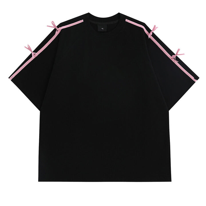 Damens oversized T-shirt med dekorativa knytband Mirla-Eva Jonsson