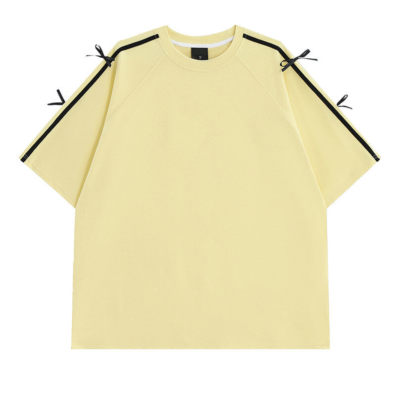 Damens oversized T-shirt med dekorativa knytband Mirla-Eva Jonsson